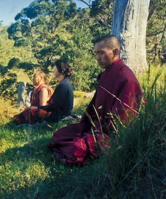 Lama Yeshe, Beatrice Ribush and Lama Zopa Rinpoche in meditation on Saka Dawa, Chenrezig Institute, Australia, May 25, 1975. Photo: Wendy Finster.