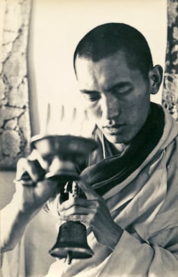 Lama Zopa Rinpoche doing puja during the Fourth Meditation Course, Kopan Monastery, Nepal, 1973. Photo: Christine Lopez.