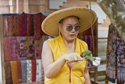 Lama Yeshe with a parrot, Java, 1979.