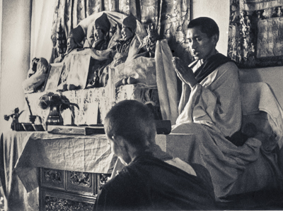 Lama Zopa Rinpoche teaching at the fourth course, Kopan Monastery, Nepal, 1973. Anila Ann is in the foreground. 