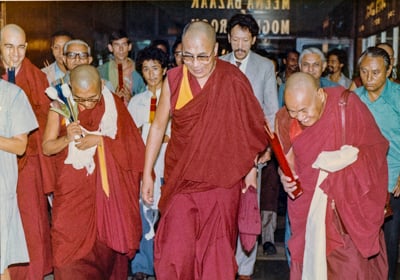 Lama Yeshe and Lama Zopa Rinpoche with His Holiness the Dalai Lama at the Third Dharma Celebration, Oberoi Hotel, New Delhi, India, 1983. Photo: Bill Kane