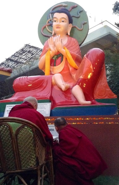 Lama Zopa Rinpoche reciting Nagarjuna prayers in front of the Nagarjuna statue at Root Institute, Bodhgaya, India, 2014. Photo: Ven. Sarah Thresher