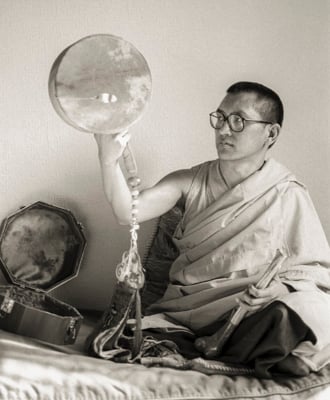 Lama Zopa Rinpoche playing the chöd damaru (drum) at Manjushri London (currently Jamyang Buddhist Centre), 1983. Photo: Robin Bath.