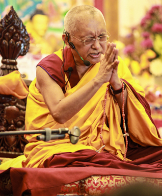 Lama Zopa Rinpoche teaching in Singapore, 2010. Photo: Tan Seow Kheng. 