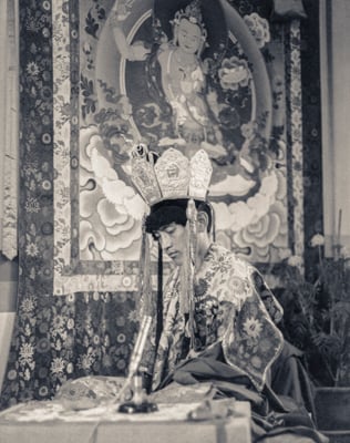 Lama Zopa Rinpoche in ceremonial dress for Heruka initiation, Manjushri Institute, England, 1978. Photo: Brian Beresford.