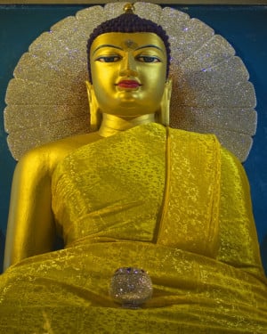 Buddha statue at Mahabodhi Temple Buddha, Bodhgaya, India. Photo from Dreamstime.