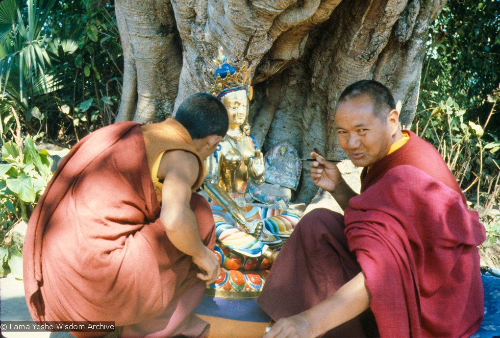 (12921_sl.tif) Lama Yeshe painting Tara, Kopan Monastery, Nepal, 1976. Lama Yeshe sent Max Mathews to buy a large Tara statue in Kathmandu, which was eventually placed in a glass-fronted house on a pedestal overlooking a triangular pond that was built under the ancient bodhi tree in front of the gompa, Kopan Monastery, Nepal. Photo by Peter Iseli.